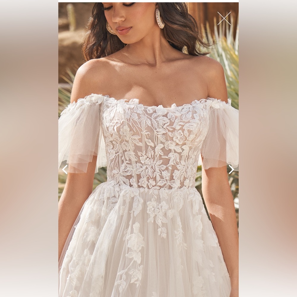 NWT, never-worn Lillian West wedding gown (style 66264) size 22 (street size 18)